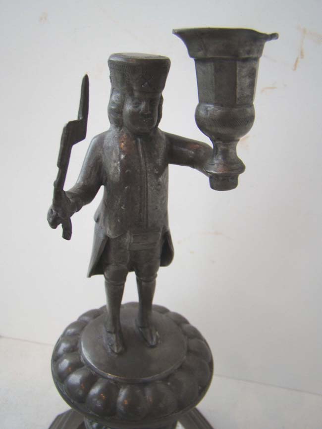 A nice pair of early 18th century Dutch pewter candlesticks depicting a Butcher and a Baker — image 2